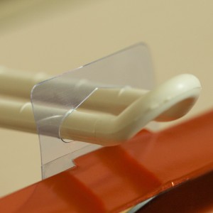 Hang Tabs - Roll Form (Small Delta-Hole)